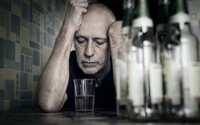 distinguish between alcohol abuse and alcoholism